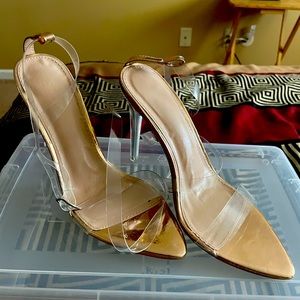 Womens size 8 strappy clear sandals.